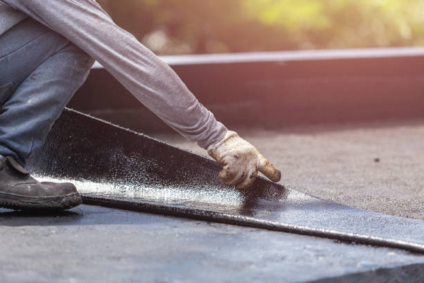 Professional Basement Waterproofing technician working in St. Andrews, SC